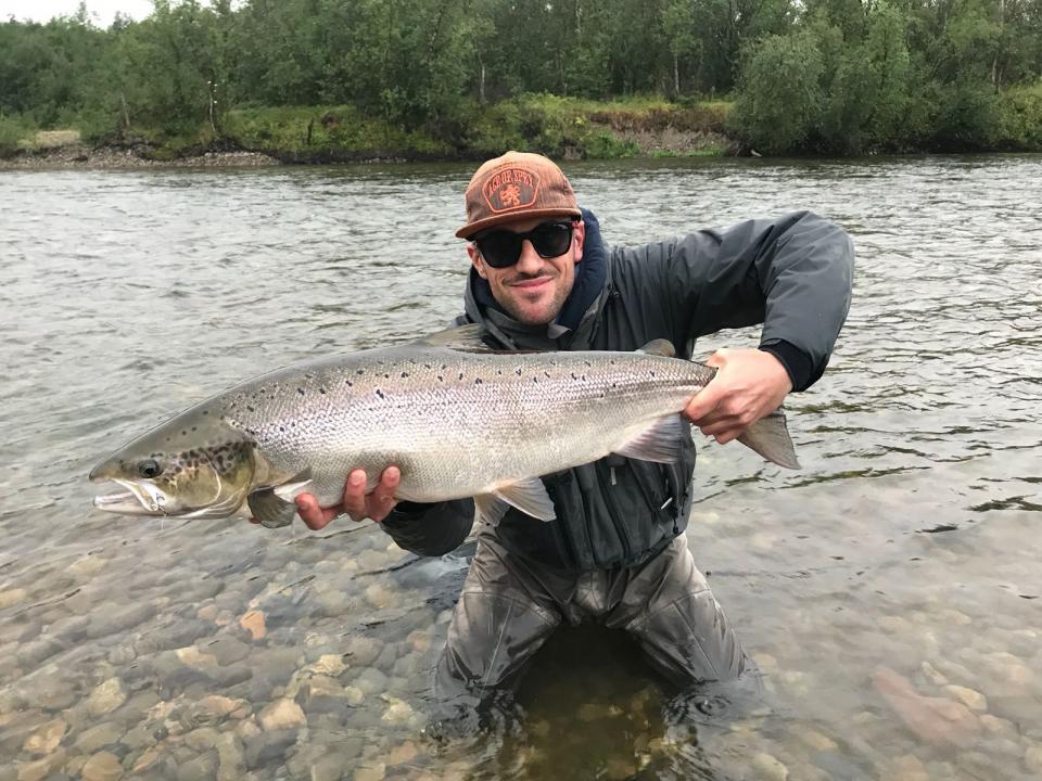 Francesco Cozzio posing with one of the salmon he caught this summer.